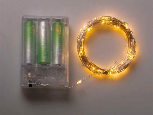 Гірлянда декоративна Роса 10м біла нитка жовта (на батарейках)